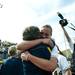 Michigan head coach Carol Hutchins embraces pitcher Sara Driesenga after the game against Louisiana-Lafayette on Saturday, May 25. Daniel Brenner I AnnArbor.com